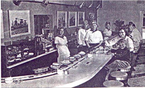 Hamburger Junction - Johnny waits for lunch Area resident, Johnny Lewis, came to Hamburger Junction with his sister for a soda, and stayed to watch the little engine do its job hauling food to the customers.